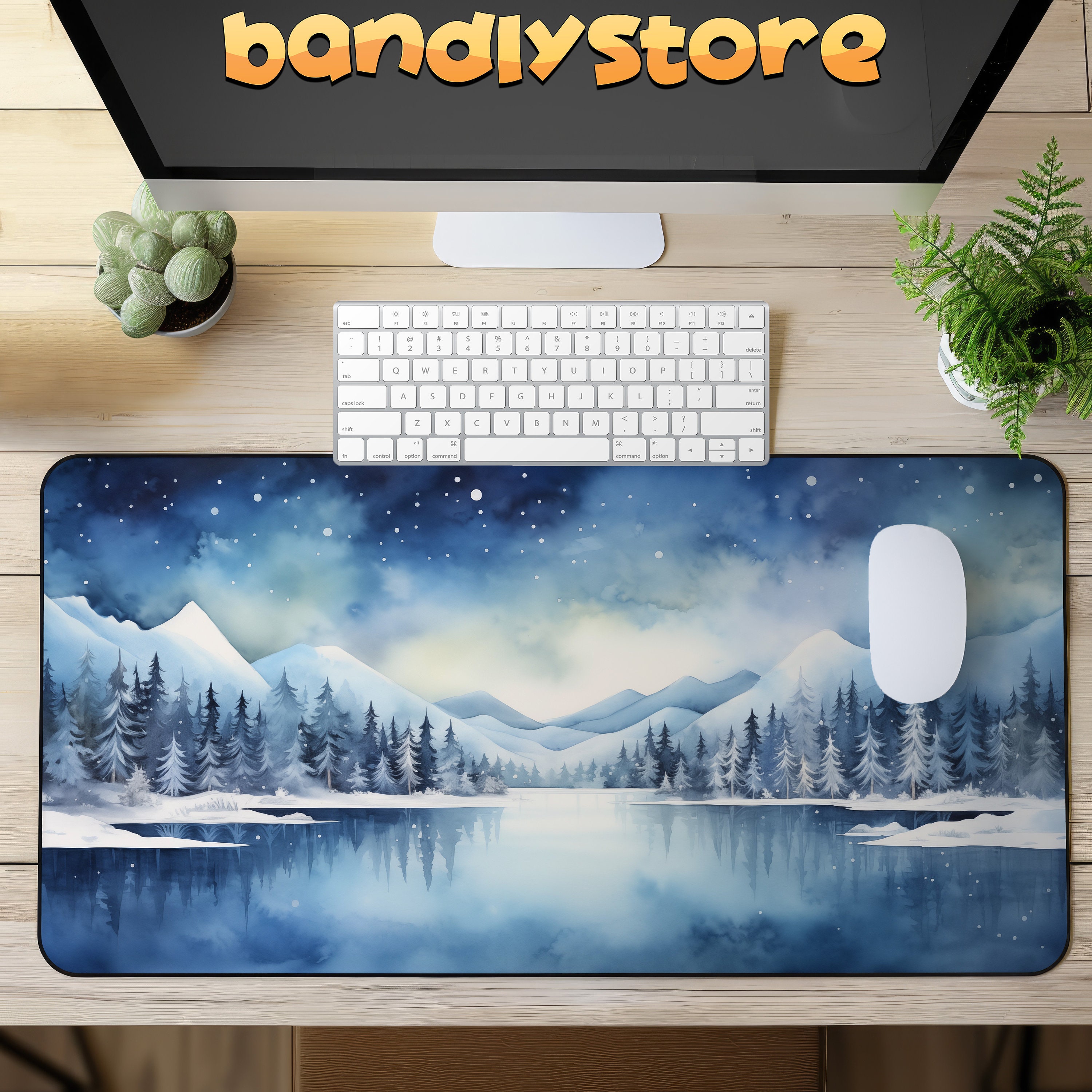 Snow Mountains Winter Desk Mat on a desk with keyboard and mouse