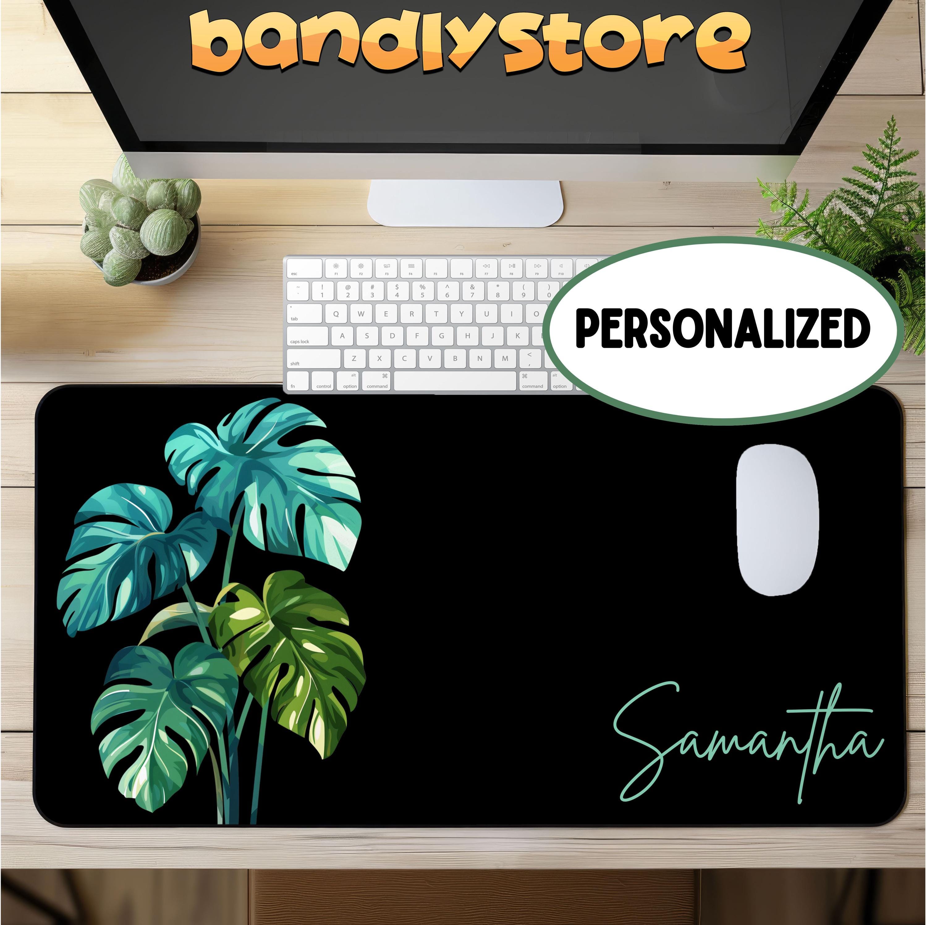 Personalized Monstera Desk Mat on a desk with keyboard and mouse