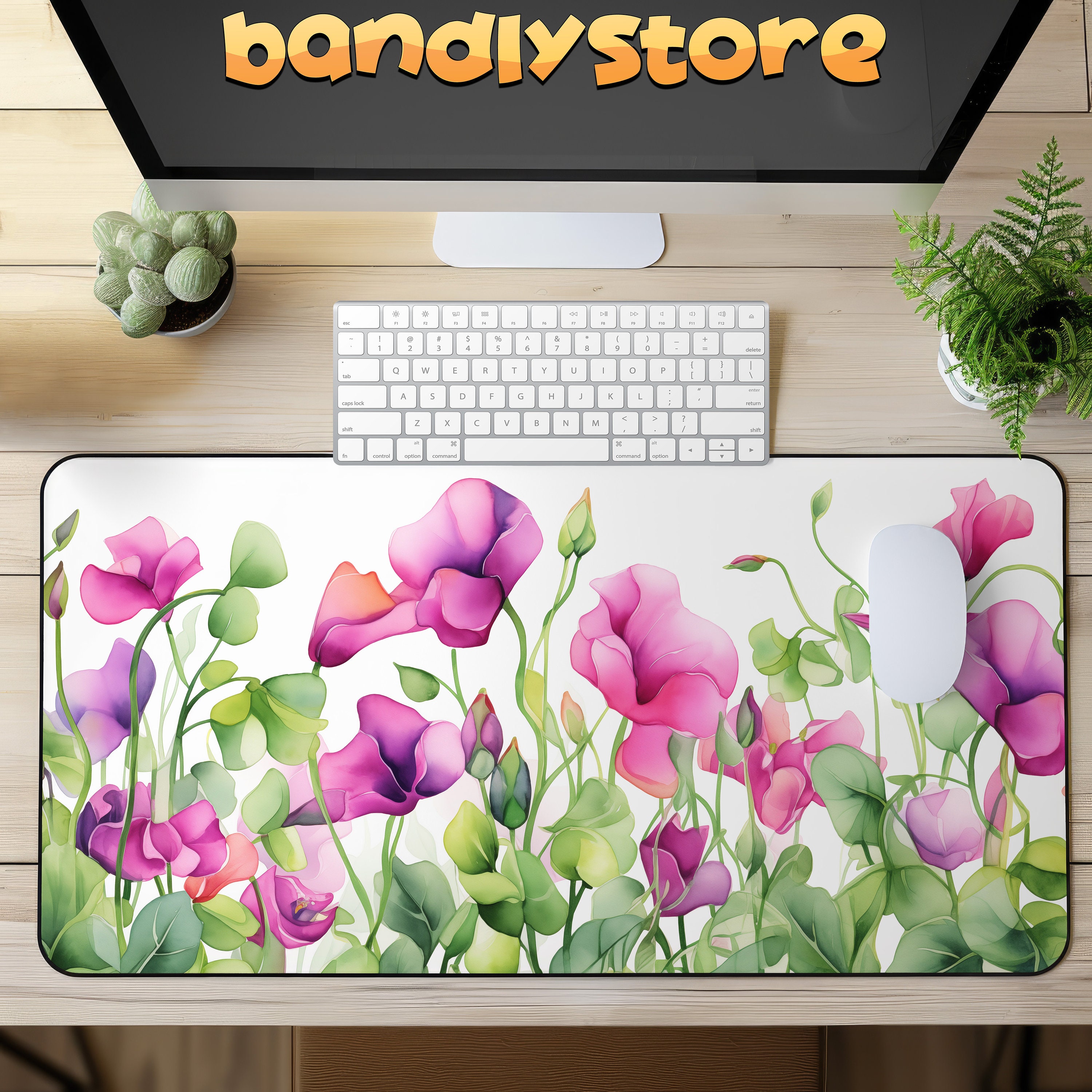 Watercolor Sweet Pea Flowers Desk Mat on a desk with keyboard and mouse