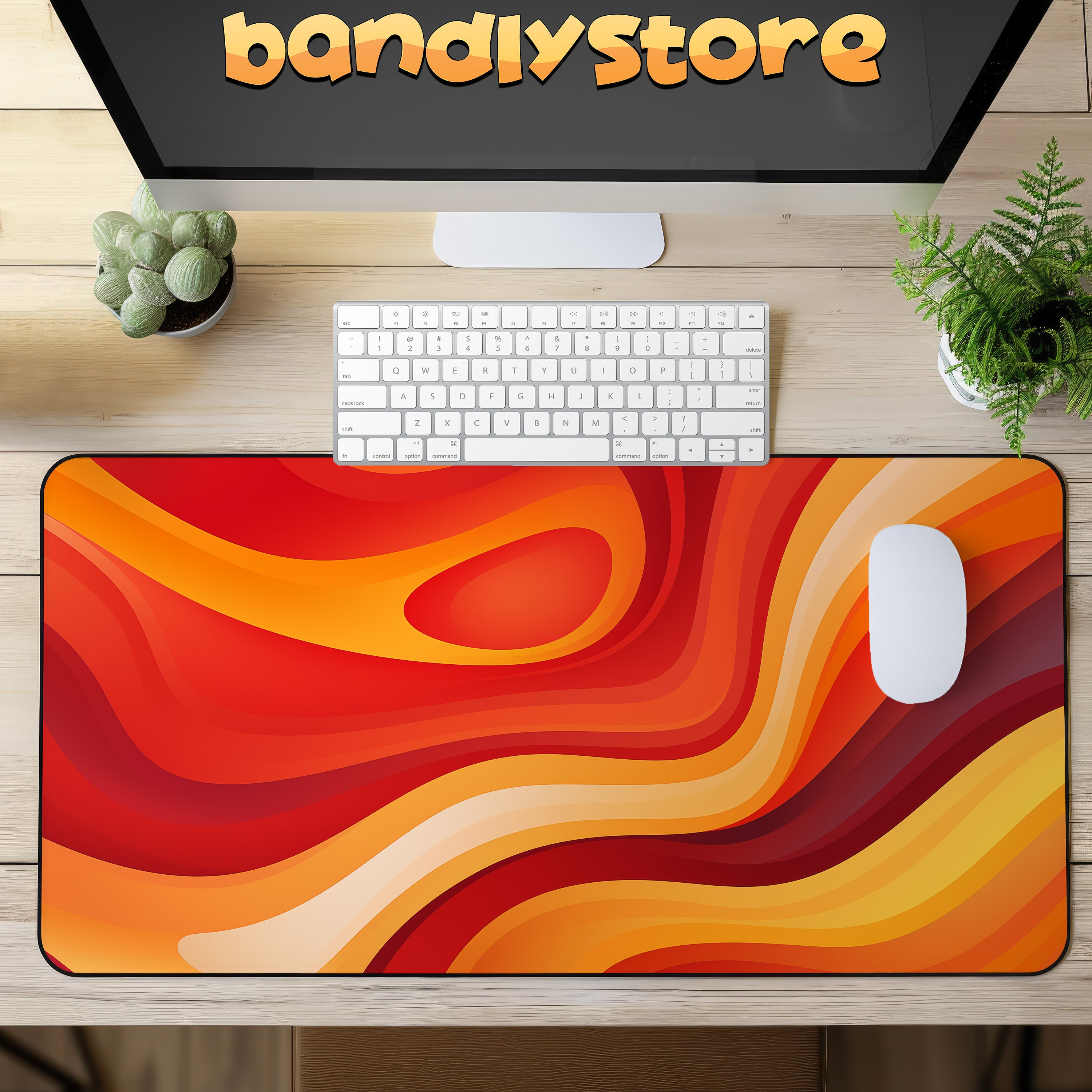 Abstract Orange Desk Mat shown on a desk with keyboard and mouse