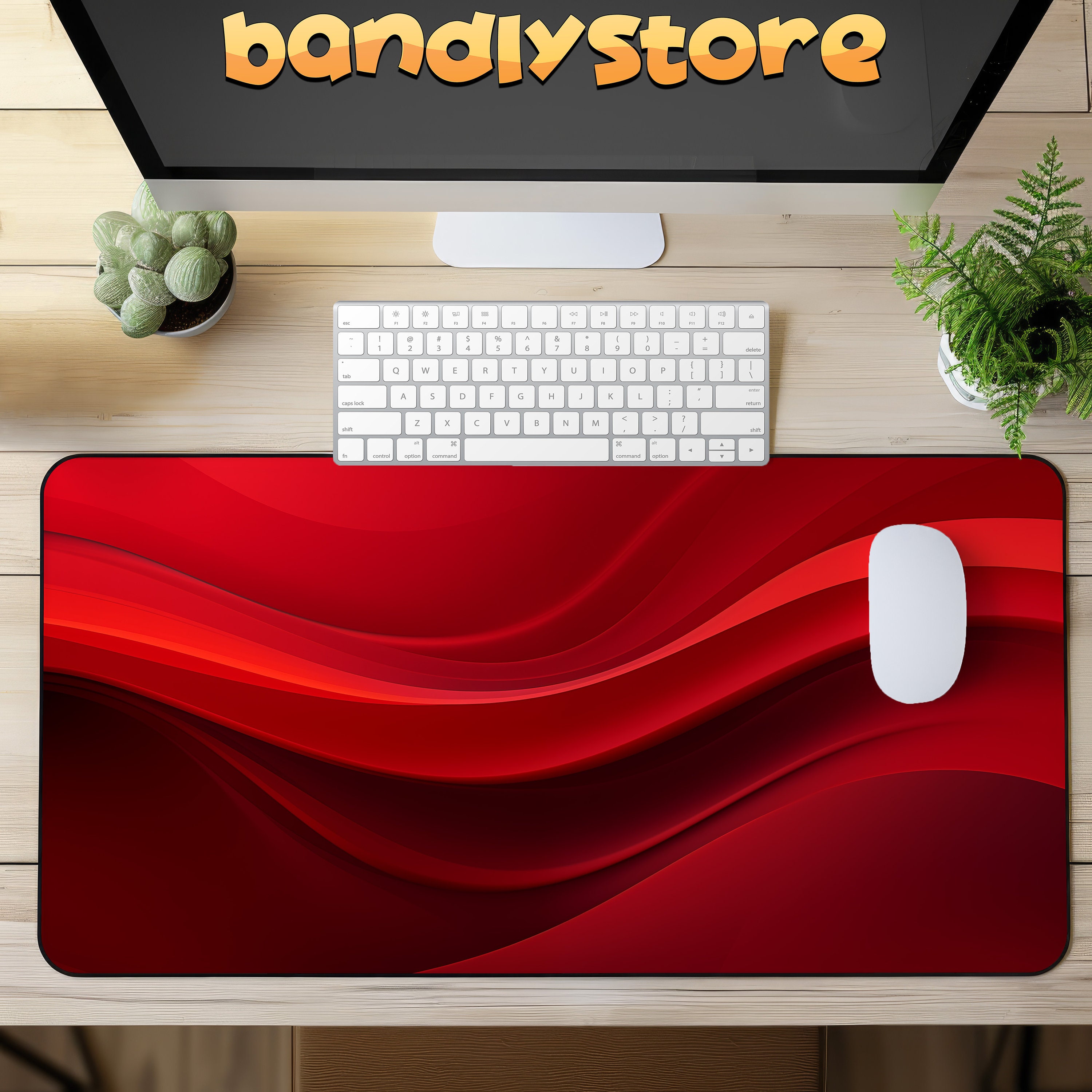 Abstract Red Wave Desk Mat shown on a desk with keyboard and mouse