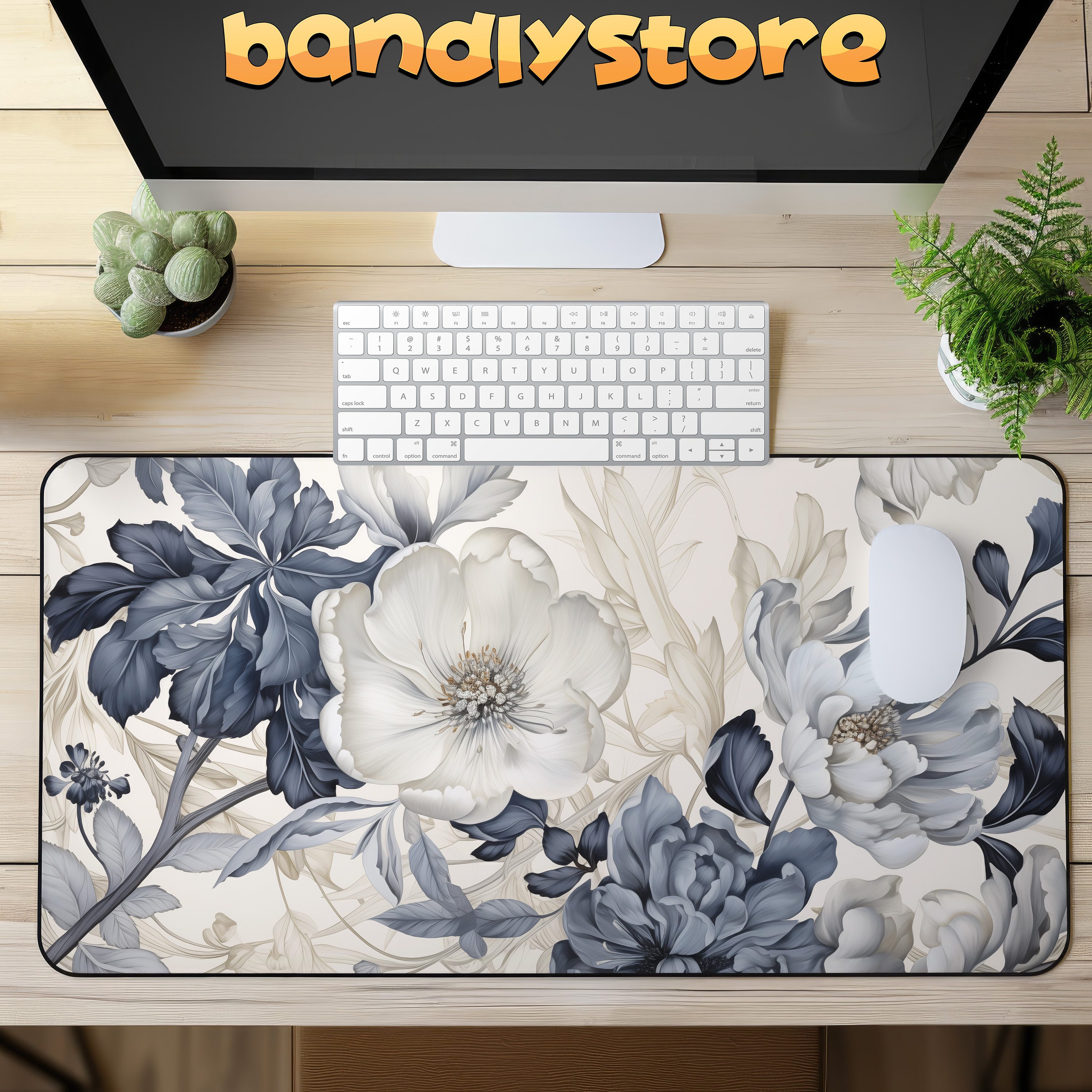 Beige And Blue Art Nouveau Floral Desk Mat on a desk with keyboard and mouse